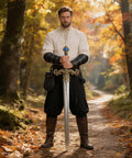 Man in Renaissance Knight Costume Kit With Leather Belt Pouch Arm Bracers And Sword Frog For Halloween Dress Up Black Dope 5 Piece Gear Set