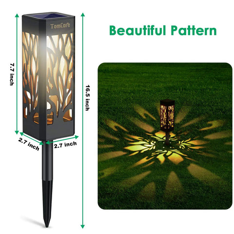 Upgraded Solar Pathway Lights Bigger and Brighter Outdoor LED Landscape Lighting with decorative patterns on grass.