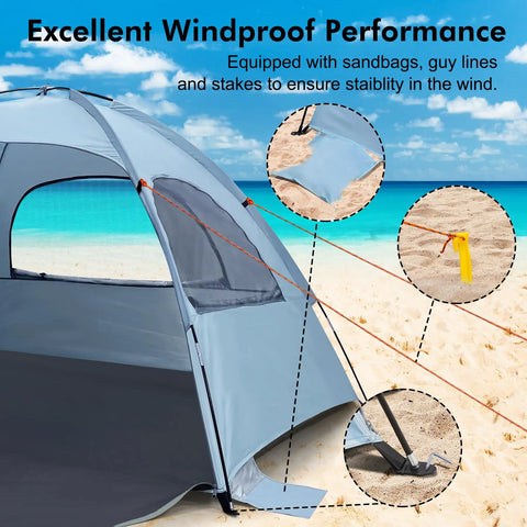 Anti UV Beach Tent For Three People, Portable Sun Shade Shelter With Extendable Floor, stakes and guy lines on sandy beach