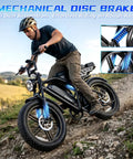 Adult Electric Bike, 750W Motor 1500W Peak Power, rider navigating rocky path with full suspension and mechanical disc brake.