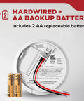 Hardwired smoke detector showing AA backup battery compartment with 2 replaceable AA batteries.