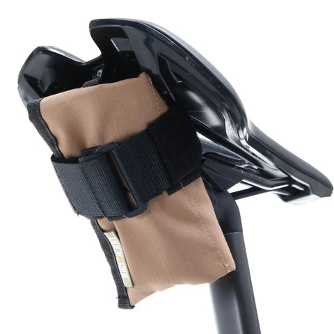 Blossom Roll Bike Saddle Bag With Three Tool Pockets And Repair Kit Organizer Water Resistant Cordura Fabric Lightweight Under Seat Pouch For Road And Mountain Biking Tan attached under bike seat