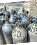 Multiple scuba tanks with Scuba Tank Valve Replacement For Diving Cylinder Valve Upgrade With Leakproof Seal attached.