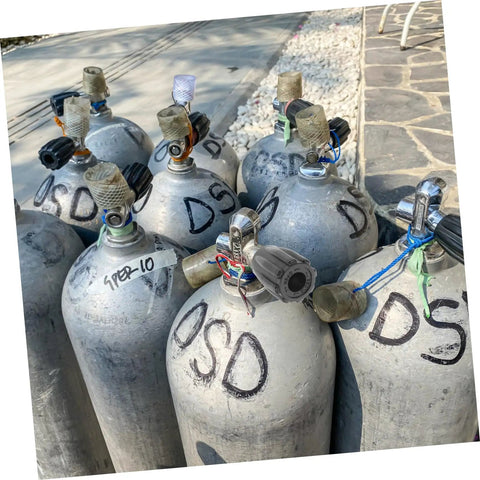 Multiple scuba tanks with Scuba Tank Valve Replacement For Diving Cylinder Valve Upgrade With Leakproof Seal attached.