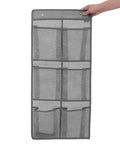 Slick Door Shoe Organizer With Six Deep Mesh Pockets And Heavy Duty Hanging Hooks, grey fabric, shown being held by hand.