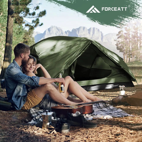 Couple relaxing beside 2 Person Waterproof And Windproof Camping Tent For 3 To 4 Seasons With Lightweight Aluminum Poles