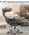 Boss Level Big And Tall Office Chair With Footrest And Lumbar Support, man reclining in gray ergonomic chair at desk