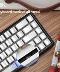Compact 60 Percent Wired Mechanical Keyboard With Full Metal Chassis And Hot Swappable Red Switches Providing Customizable Rgb Lighting For Pc Gamers Wanting A Straight Durable Rig Upgrade That Is Totally Dialed In, showcasing metal keys and connection detail.
