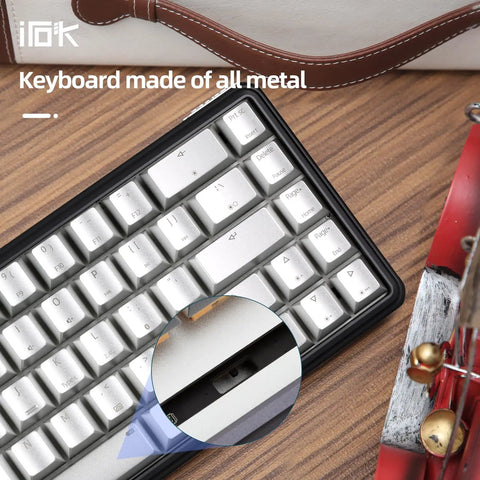 Compact 60 Percent Wired Mechanical Keyboard With Full Metal Chassis And Hot Swappable Red Switches Providing Customizable Rgb Lighting For Pc Gamers Wanting A Straight Durable Rig Upgrade That Is Totally Dialed In, showcasing metal keys and connection detail.