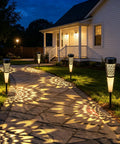 Pathway illuminated by Solar Torch Lights Outdoor With Flickering Flame For Pathways And Garden Waterproof Landscape Lighting