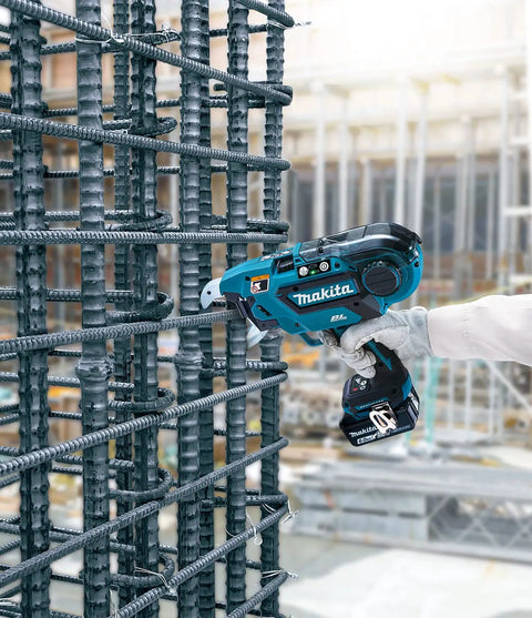 Makita DTR181ZJ 18V Brushless Rebar Tying Tool In Makpac Case fastens steel bars on construction site with precision.