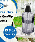 Glass Tabletop Torch Set Four Pack For Outdoor Use With 13.5 Oz Citronella Fuel on a table showing ideal size and quality glass.