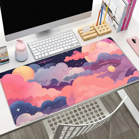 Cute Desk Pad With Kawaii Clouds In Pink And Purple XXL Full Desk Mat For Gaming And Work displayed on an office desk.