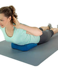 Teeter Core Restore Inflatable Lumbar Support Cushion For Back Pain Relief And Posture Correction used by a woman during core exercises.