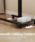 Close-up of Overbed Table With Wheels Adjustable Height 23 to 33 Inches, showing smooth rolling casters on hardwood floor.