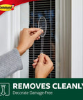 Hands using Outdoor Heavy Duty Adhesive Strips For Hanging Hooks And Decor Clear Weather Resistant Large And Medium Refill