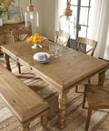 Dining room with rustic dome glass pendant light with clear shade and natural wood accents for industrial modern kitchen look.