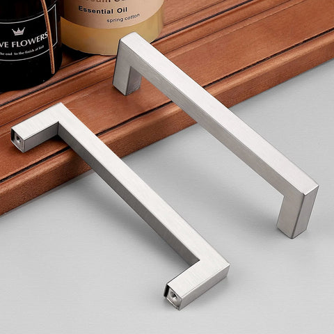Square Kitchen Cabinet Handles Brushed Nickel Stainless Steel Euro Bar Pulls With Five And One Half Inch Total Length And 128 Millimeter Hole Centers Modern Hardware For Cabinets And Drawers, two handles displayed on a wooden surface.