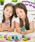 Two girls painting heart rocks with the Glow In The Dark Heart Rock Painting Kit For Kids Ages 4 To 12, STEM Craft Set With Puffy Paint