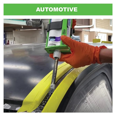 Person using B-Line Manual Multi-Component Epoxy Adhesive Gun for 1 To 1 And 2 To 1 Cartridges on car panel.