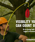 Person using Pro Arborist Throw Line Kit With 150 Ft Throw Rope And Throw Bag Weight outdoors for safe tree climbing.