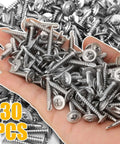 A hand holding Heavy-Duty 410 Stainless Self-Tapping Screws Set With Flat Head Phillips for wood and sheet metal, 30 pieces.