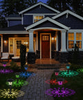 8 Pack Glass Solar Outdoor Lights With 1000mAh Solar Panel Warm White Color Changing Modes illuminating garden path at night