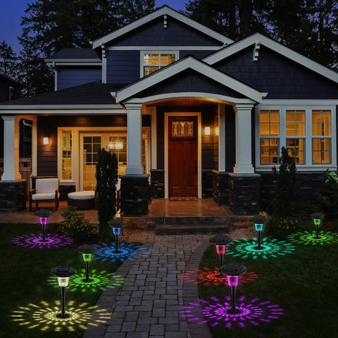 8 Pack Glass Solar Outdoor Lights With 1000mAh Solar Panel Warm White Color Changing Modes illuminating garden path at night