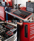 Magnetic Tool Mat 4 Pack Flexible Holds Tools Tight With 40Lb Magnetic Power Keeps Screwdrivers, Wrenches, Bolts Secure On Tilt Or Vibration, Ultimate Workbench Organizer For Garage And Shop on a red workbench with tools
