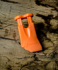 Dope Mini Climbing Wedge For Arborists, Stowable Carabiner Friendly Tool Carrier Felling Wedge on wood surface, solid plastic