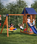 Children playing on Applewood Cedar Wooden Swing Set With Double A Frame And Easy Setup, 32 Inch Saucer, Slide, Covered Fort, and Basketball Hoop