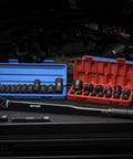 Beefy 1/2-Inch Drive Click Torque Wrench With 25-250 Ft-Lb Range shown with sockets and case in a garage setting