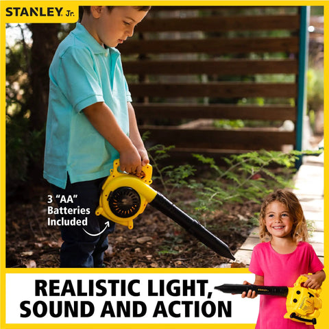 Child holding Red Toolbox Junior Battery Operated Blower Toy For Kids with Realistic Sound And Action in a garden setting