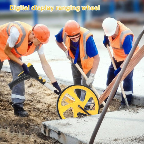 Men using a Tough Foldable Digital Measuring Wheel With Telescopic Shaft And Sweet Backlit Readout Includes Compact Tape Measure at a construction site.