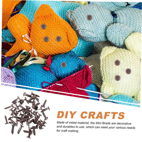 Fifty Piece Double Foot Spikes Metal Brads For Scrapbooking And DIY Crafts Durable Paper Fasteners with colorful knitted toys.