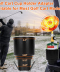 Portable Propane Golf Cart Heater for Outdoor Use installed in golf cart cup holder, golfer swinging in chilly weather.