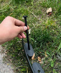 Hand securing Flexible Lawn And Garden Edging Border 1.5 Inch By 16 Foot Black Reinforced Plastic Grass Border for flower beds