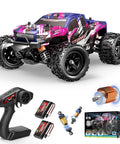 Off Road Pink RC Monster Truck For Girls 1 To 18 Scale 4WD Car With Dual Rechargeable Batteries displayed with controller and accessories