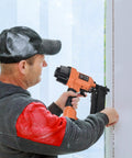 Person using 16 Gauge Pneumatic Finish Nailer for trim and molding projects from seven eighths inch to two and a half inches
