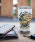 Patriotic 4th Of July Stainless Steel Insulated Tumbler With Retro Sailboat And Red White And Blue US Flag Design Double Wall Vacuum Insulated Travel Cup For Hot Or Cold Drinks Proud Land Of The Free Since 1776 on table