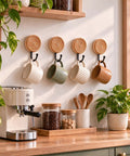 Four Pack Slick Boho Wall Hooks Decorative Wide Opening Coat Rack For Towels Backpacks And Purses With Rock Solid Screw Mount Heavy Duty Home Storage For Keys Jewelry And Everyday Carry mounted with mugs in kitchen.