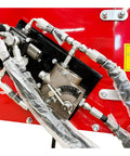 Close-up of 8 Inch PTO Wood Chipper With Hydraulic Infeed red exterior with visible hydraulic connections for yard debris chipping machine.