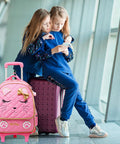 Girls Rolling Backpack Trolley School Bag With Cat Face Bowknot Pink Reflective Strip Cute Luggage For Kids at airport