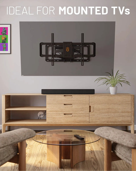 Wall Mounted White TV Cord Hider Kit With Two Pass Throughs Locking Brackets And Drill Attachment installed behind TV on wall