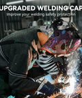 Welder using Reversible Welding Cap With Elastic Retractable Band for all day comfort and protection, shown during welding work.