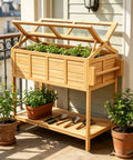 Ergonomic Elevated Garden Bed On Wheels With Cover And Storage Shelf For Backyard Patio Outdoor All In One Raised Planter Box Cart With Bed Liner Seed Starter Tray And Drainage Slits on a balcony.