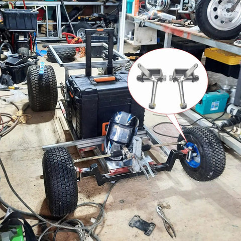 Go Kart Steering Spindle Bracket Kit With Five Eighth Inch Axle Four And A Half Inch Kingpin installed on a go-kart frame in workshop.