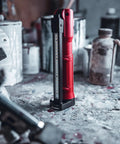 Red Stinger Switchblade 800 Lumen Rechargeable Multi Function LED Work Light on a workshop table