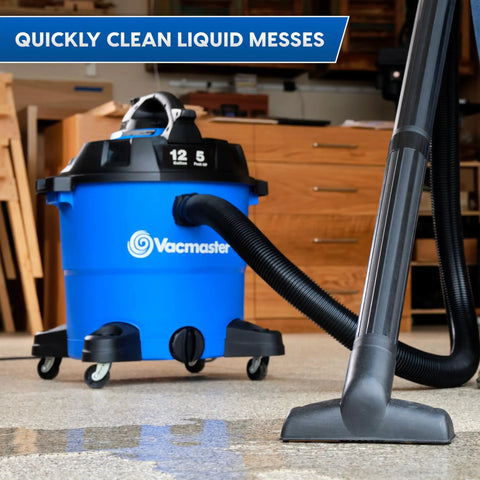 Beast 12 Gallon Wet Dry Vacuum with Detachable Blower in workshop, 5 Peak HP, 106 CFM, showing wide stance and hose setup