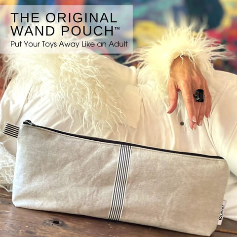 The Original Wand Pouch Storage Case with striped design on table, fits full-size wand massagers, room for chargers and accessories.